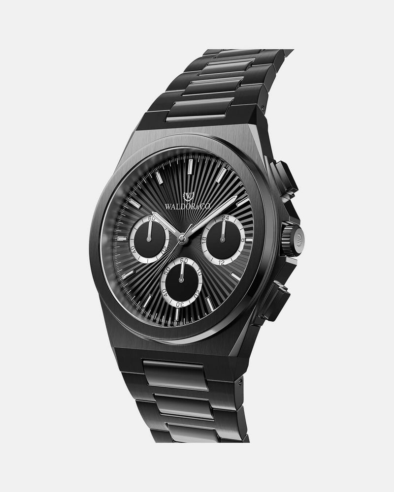 A round mens watch in black Rhodium-plated 316L stainless steel from Waldor & Co. with black sunray dial and luminous hands. Seiko movement. The model is Inceptive 40 Azores.