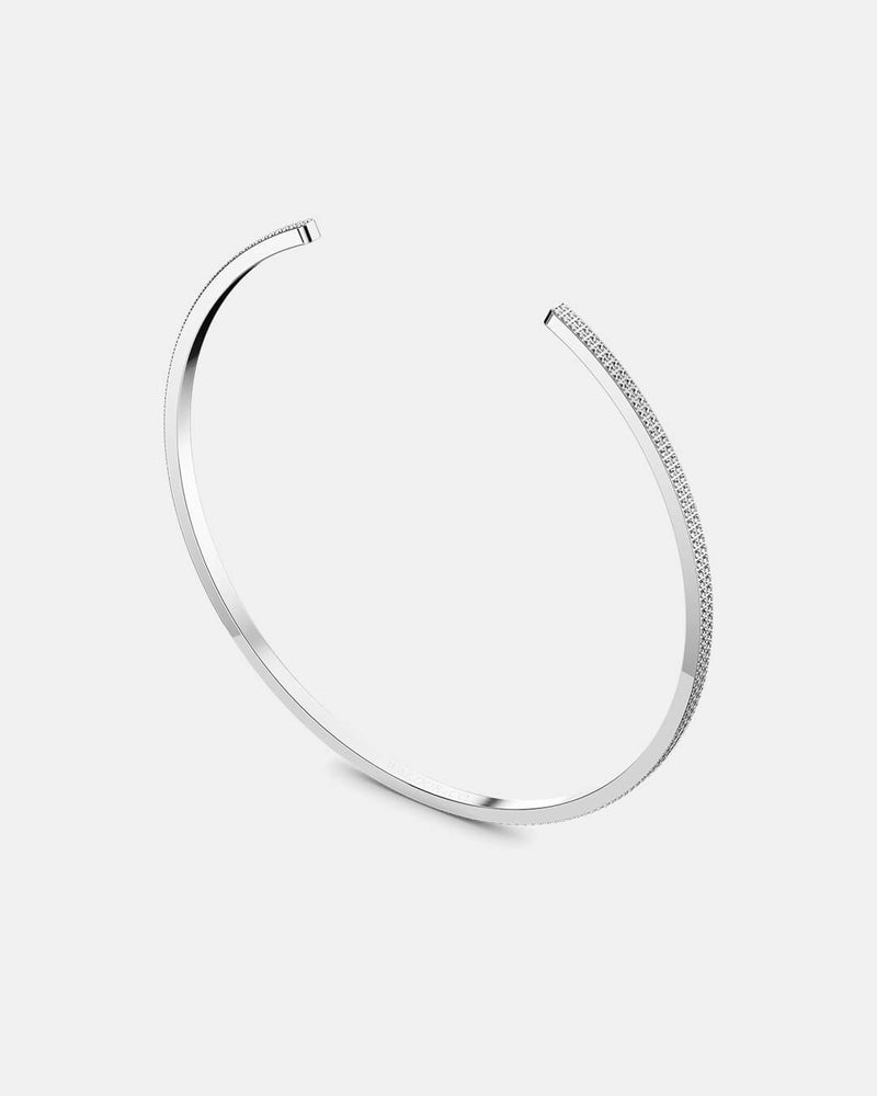  A polished stainless steel bangle in silver from Waldor & Co. One size. The model is Pave Bangle Polished.